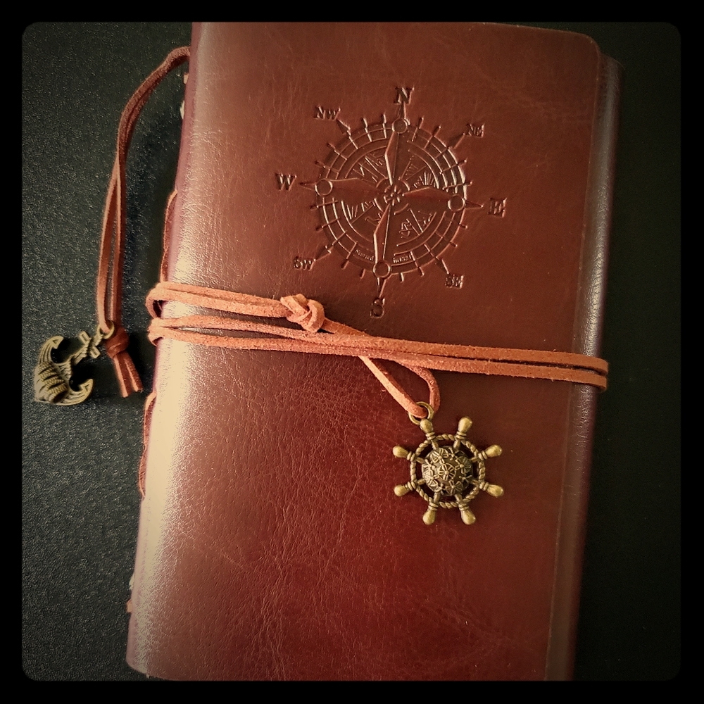 Leather journal with nautical charms. 6" X 4"